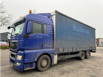 Plachtový nákladní auto MAN TGX 26.400